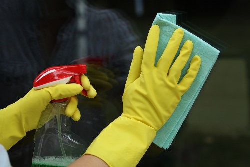 Cleaners Bow staff handling sorted recyclable materials in an eco-conscious setting