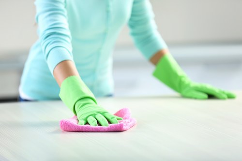 Local cleaning team servicing a Bow office workspace